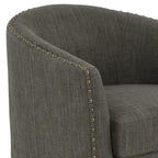 Fauteuil pivotant décoratif rembourré avec clous de tapissier